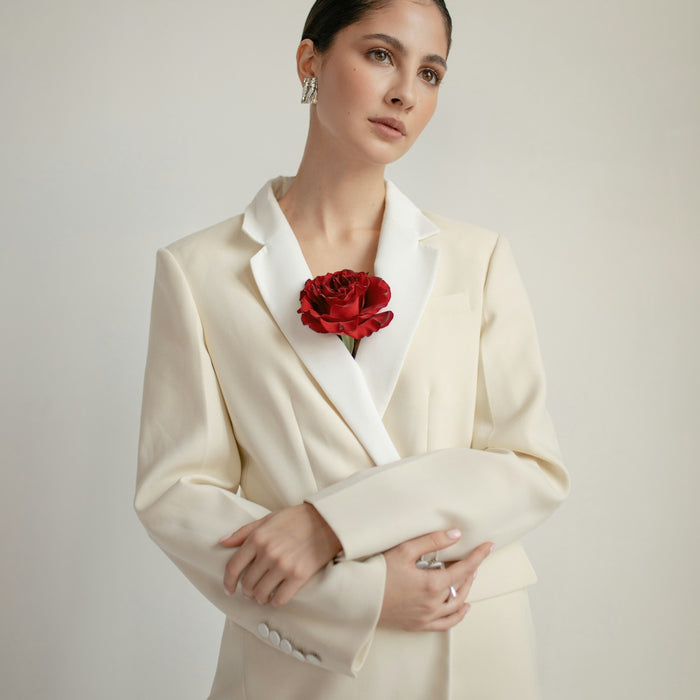 woman wearing white blazer