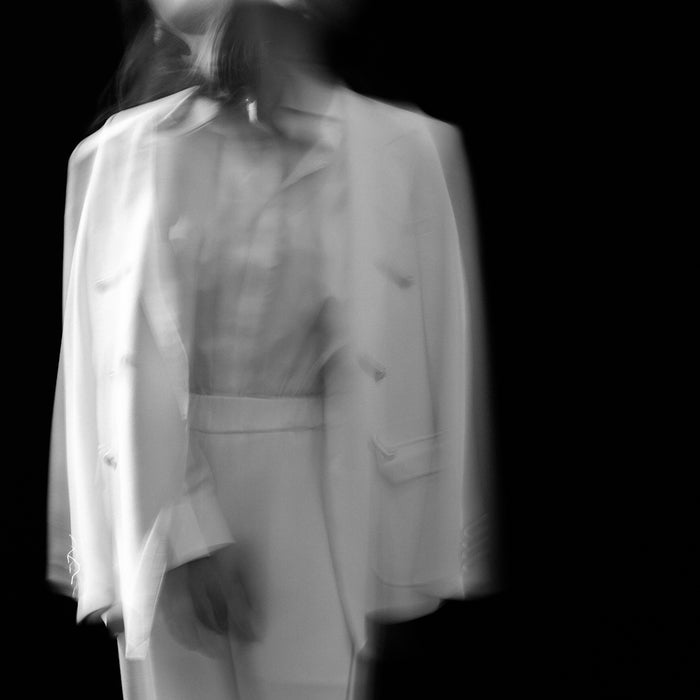 woman in white long sleeve dress