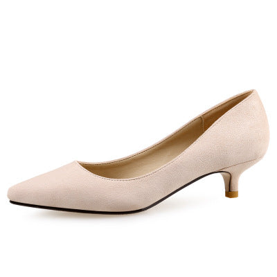 Beige high-heeled shoe on a white background