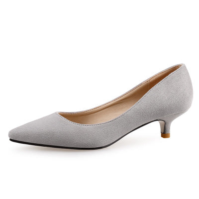 Gray high-heeled shoe on a white background
