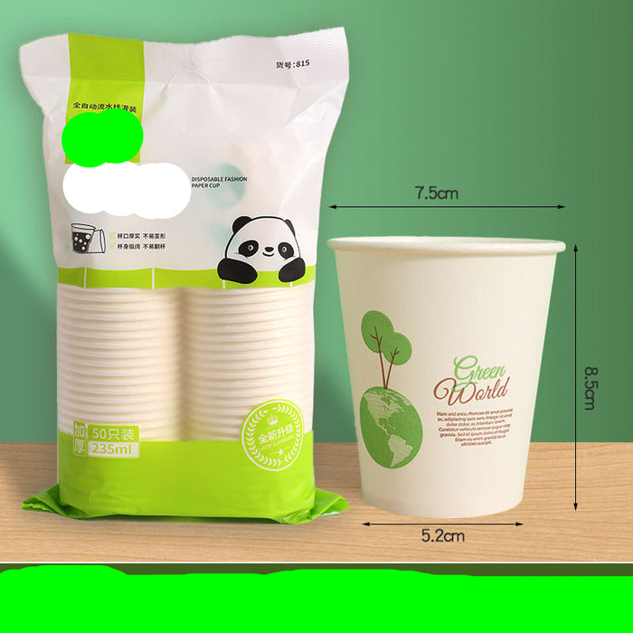 A package of disposable paper cups shown next to a single printed cup on a wooden surface against a green background. The package is white and green with a panda 