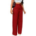 Red wide-leg pants worn by a person on a white background