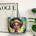 Tote bag with a design of a woman's face on a magazine with 'VOGUE' branding.
