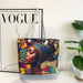 Colorful tote bag with a design of a woman wearing a headscarf on a white surface with a 'Vogue' magazine.