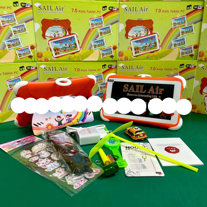 A children's tablet gift set displayed on a green surface with multiple SAIL Air 7.0 Kids Tablet PC retail boxes in the background.