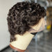 Curly wig on a mannequin head with a blurred background