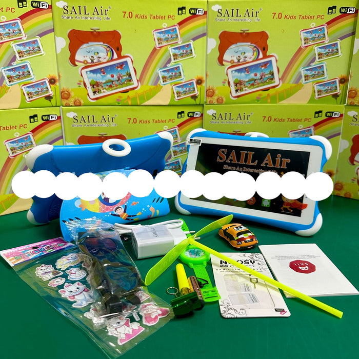 A children's tablet learning set displayed on a green surface with multiple SAIL Air 7.0 Kids Tablet PC retail boxes in the background.