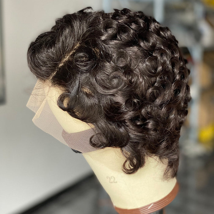 Curly wig on a mannequin head with a blurred background