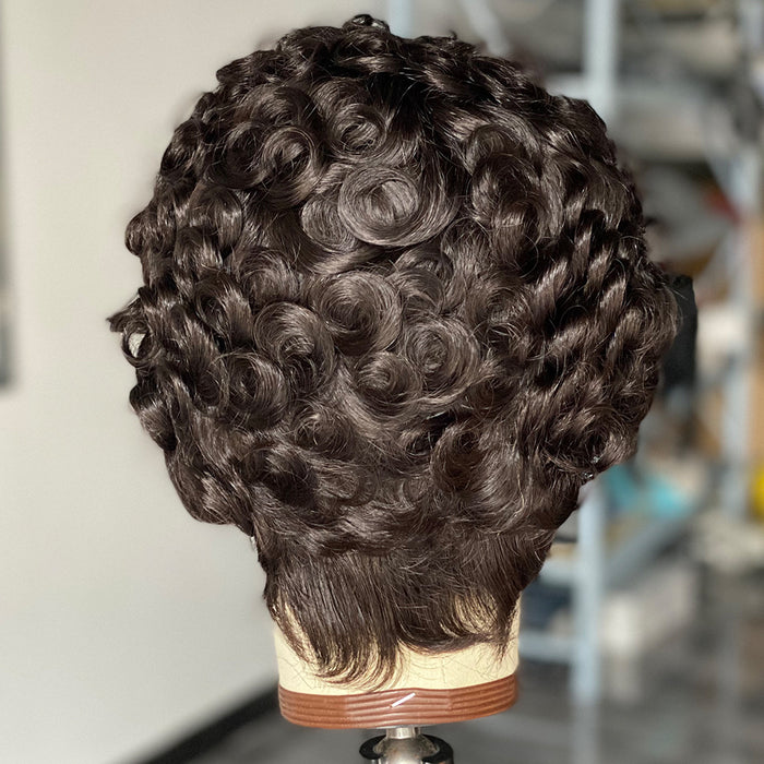 Curly wig on a mannequin head with a blurred background