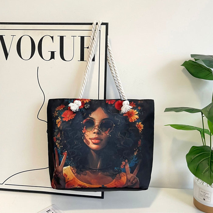Tote bag with a design of a woman with flowers, placed on a surface next to a 'Vogue' magazine.