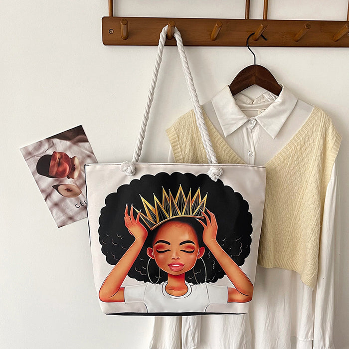 Tote bag with a design of a woman with a crown on a hanger with clothes in the background.