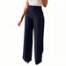 Navy blue wide-leg pants worn by a person on a white background
