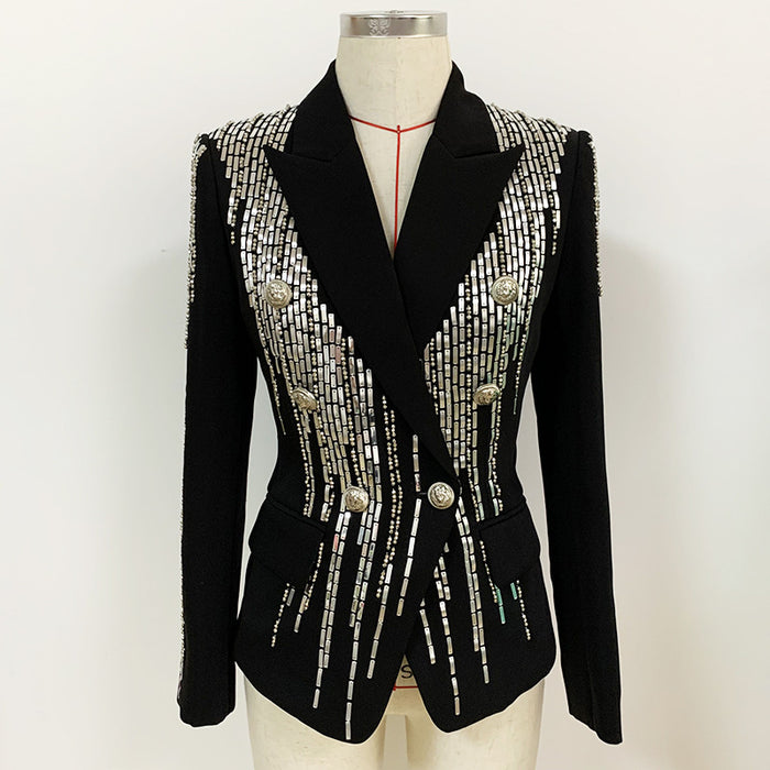 Black blazer with silver embellishments on a mannequin against a white background