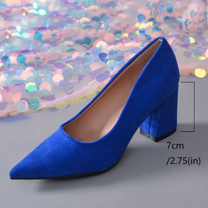 A single bright royal blue pointed-toe high heel pump shown on a gray surface with a sequined backdrop. A measurement annotation indicates the heel is 7 cm (2.