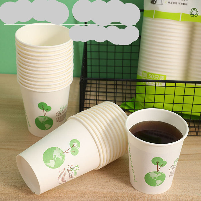 A set of white paper disposable cups with green globe graphics, shown in stacks and a single cup filled with dark liquid on a tabletop. Chinese text overlays are present at the top, and a green-and-white product bag is visible in the background.