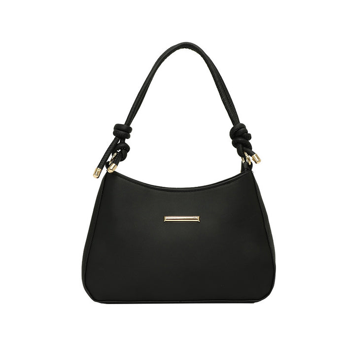 A black shoulder bag with a curved top, knotted strap details at the shoulders, and a small horizontal gold-tone metal accent on the front, shown against a plain white background.