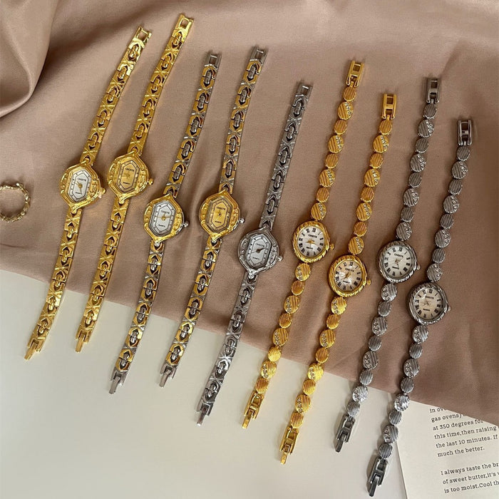 Six women's watch bracelets displayed in both gold and silver tones, arranged diagonally on a beige satin fabric background with a page of text in the corner.