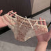 A pair of women's lace underwear held up by two hands. The underwear features a brown leopard print pattern over a sheer nude-beige mesh base, with a small white bow at the center front and beige lace trim.
