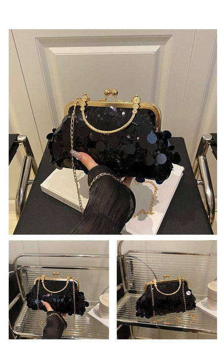 Black sequin handbag with gold accents on a black surface, displayed against a neutral background.