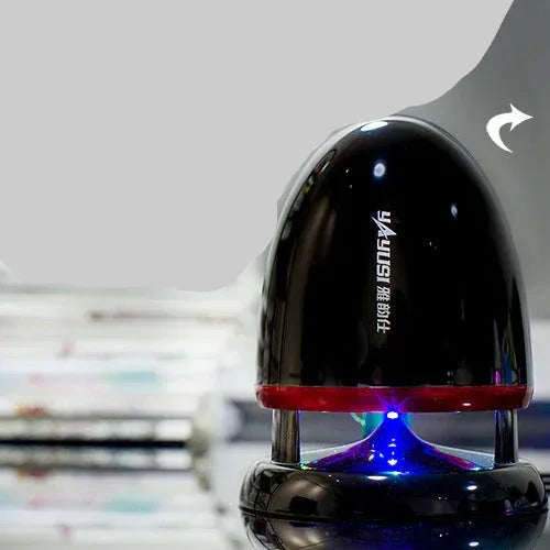 Black and red electronic device with blue light on a blurred background