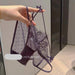 A hand holds up a dark purple lace and mesh panties set with adjustable straps and bow details, set against an indoor background with a visible SANZHIMAO UNDERWEAR watermark.