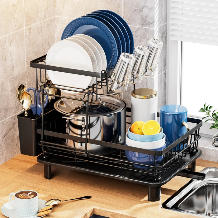 Black dish rack with dishes on a kitchen counter