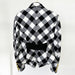 Black and white checkered shirt with a draped front on a white background