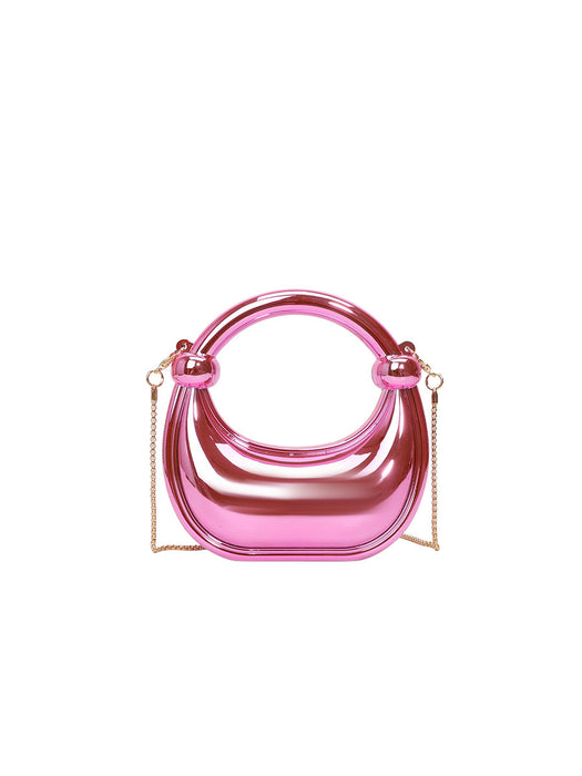 Pink handbag with a chain strap on a white background