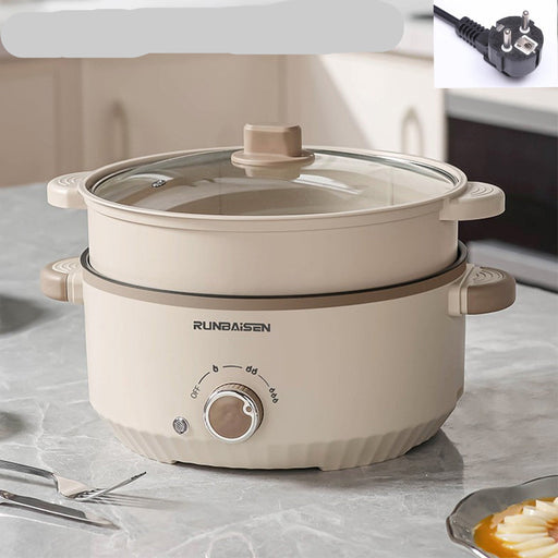 Beige electric pot with control knob on a marble surface