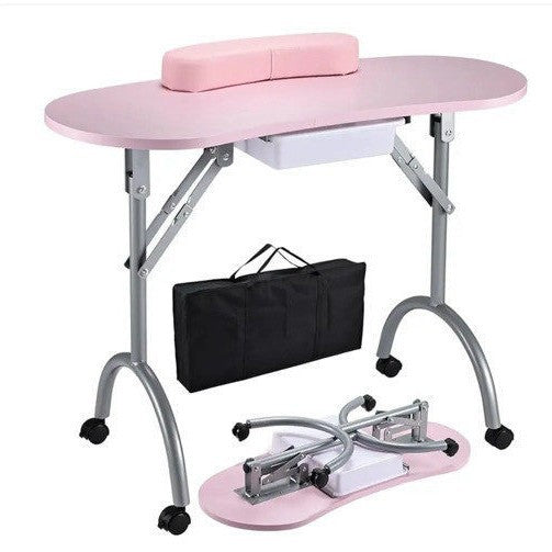 Pink nail art station with accessories on a white background