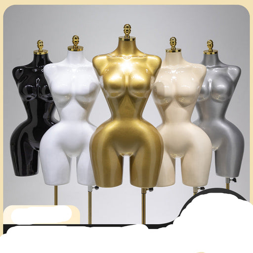 Mannequins in various colors on a gray background