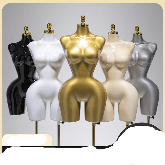 Mannequins in various colors on a gray background