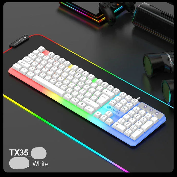 White keyboard with RGB lighting on a dark surface, surrounded by gaming accessories.