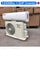 Air conditioning unit with technical specifications displayed on a concrete floor.