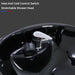 Stretchable shower head with heat and cold control switch on a dark background