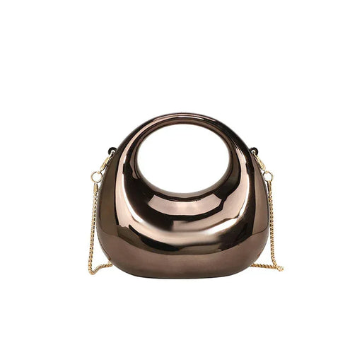 Rose gold handbag with chain strap on a white background