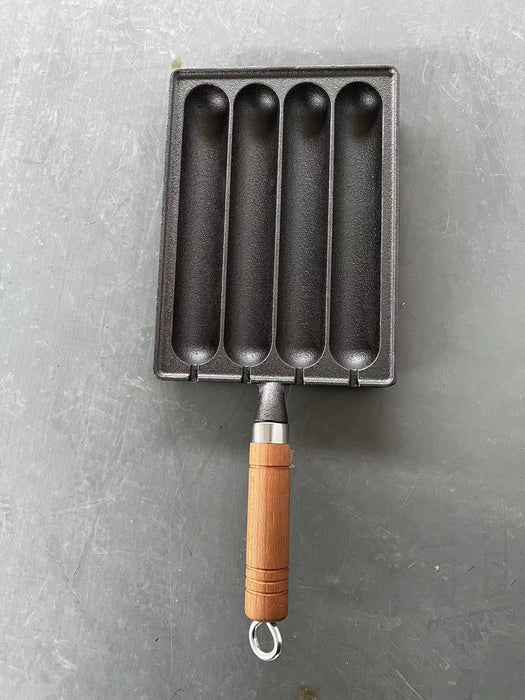 Black metal tool with wooden handle on a gray background