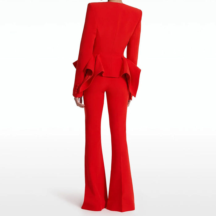 Red outfit with a peplum top and flared pants on a white background