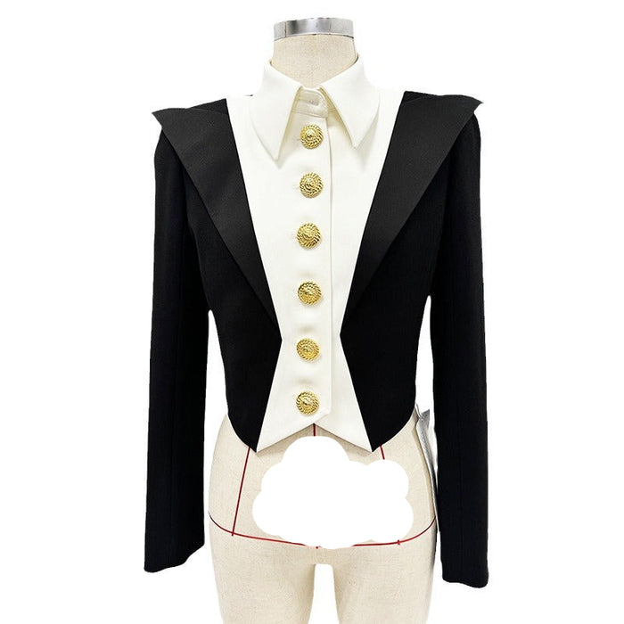 Black and white formal jacket with gold buttons on a mannequin against a white background
