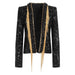 Black sequined jacket with gold fringe on a white background