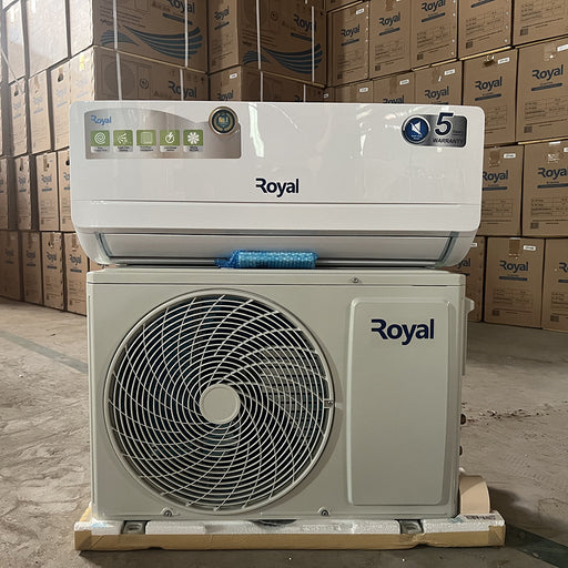 Royal air conditioning unit in a warehouse setting with stacked boxes in the background