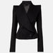 Black blazer on a light gray background