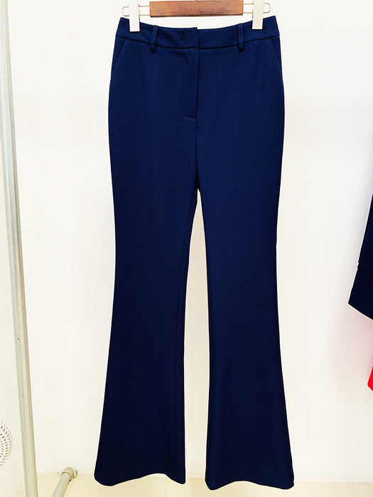 Navy blue pants on a hanger against a white background
