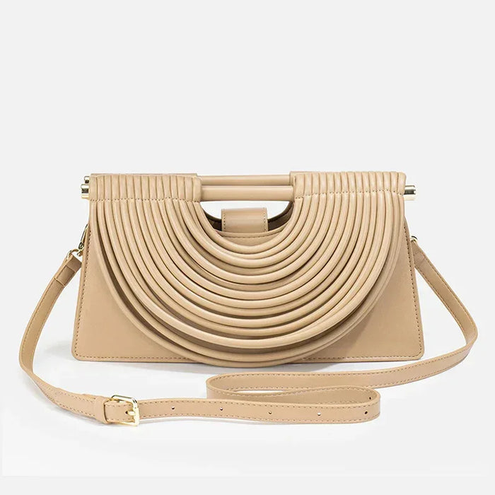 Beige handbag with a unique design on a light gray background