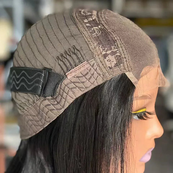 Close-up of a wig with lace front and mesh cap, blurred background