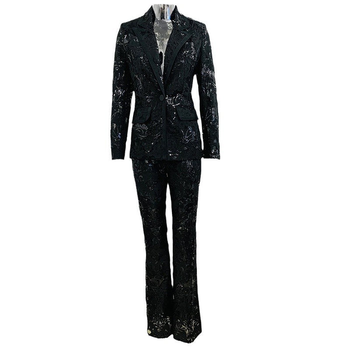 Black floral patterned suit on a mannequin against a white background