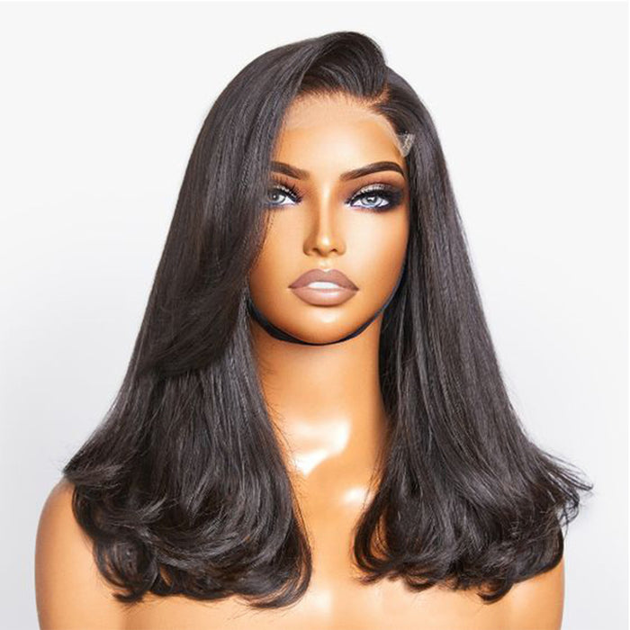 Mannequin head with a black wig on a white background