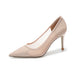 Beige high-heeled shoe on a white background