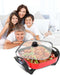 Family lying on a couch with a hot pot in the foreground, featuring the Hongxi brand.
