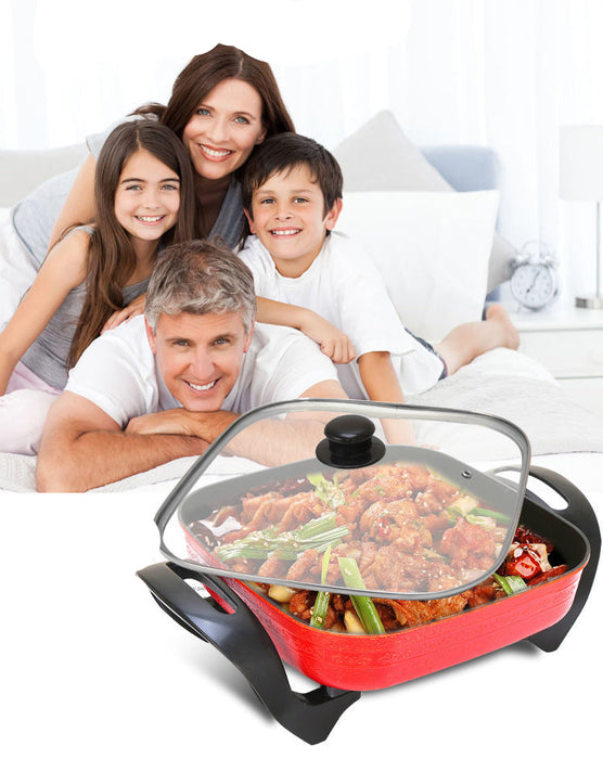 Family lying on a couch with a hot pot in the foreground, featuring the Hongxi brand.